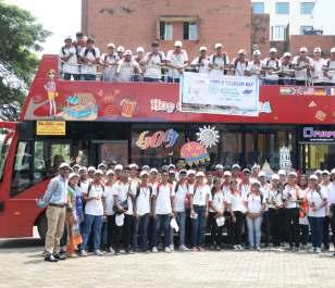 An exclusive tour was arranged on the open top Hop on Hop off bus for college students.