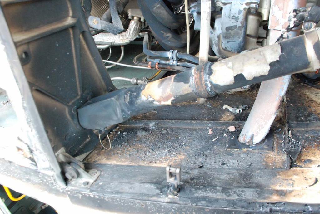 Figure 11: The most intense fire occurred on the floor just in front of the bulkhead frame 1.15 Survival Aspects Not relevant to this investigation. 1.16 Tests and Research Not relevant to this investigation.