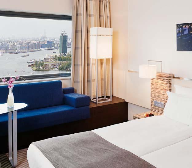 Rooms amenities. Mövenpick Hotel Amsterdam City Centre offers 408 contemporary guestrooms and suites, with spectacular views over the historical city centre of Amsterdam or the river IJ.