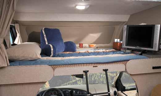 The Cabover Area, with patented slide over bunk, is a teenager s dream with the optional 19" LCD TV with remote and DVD player, all