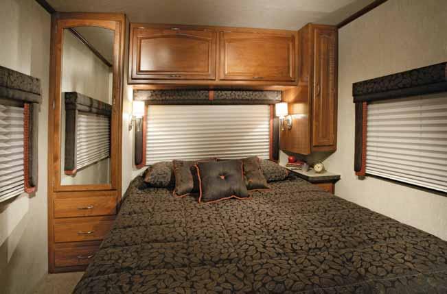 JAMBOREE GT The Bedroom boasts a spacious, queen-size innerspring mattress with a plush comforter and pillow shams.
