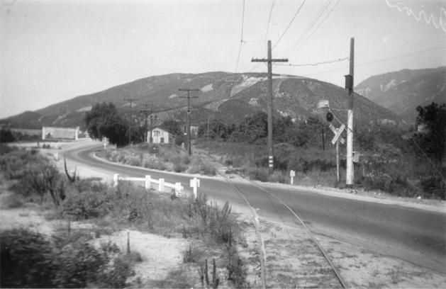 Here, the Arrowhead Line crossed Waterman Canyon Road (present day Highway 18), near Arrowhead Hot Springs. Note the wigwag signal gaurding the crossing.