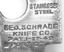 The earliest 1942 stamps still had the curved name "Geo. Schrade" on them. Some of these were stamped on the rear with the words "Stainless Steel". Later the name "Geo. Schrade" was straightened out.
