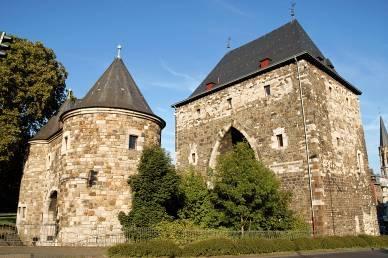 a GERMAN TEAM COLOGNE AACHEN Aachen Half-Day Tour Aachen Cathedral Ponttor Gate Town Hall Board your motorcoach to tour this German city located west of Cologne near the Dutch border.