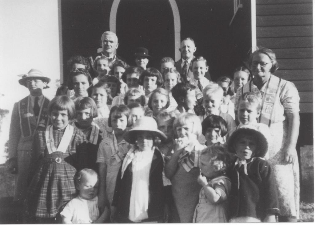 Junior Orange Lodge at Yandina Presbyterian Church, 1942. Adults: far left Mrs Puddle, centre Thomas and Mrs Miller (Brisbane), Ernie Puddle, unknown.