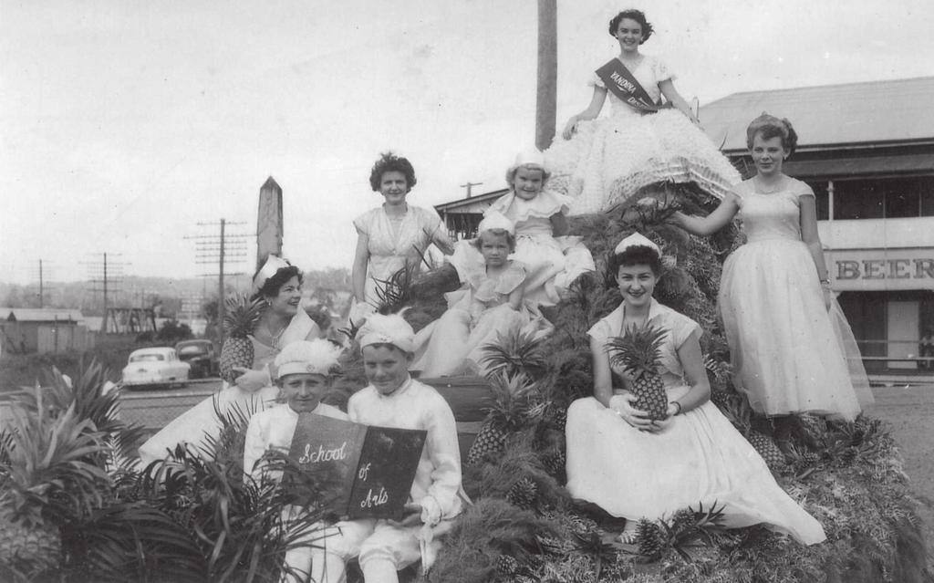 Pineapple Queen Competition, 1955. From left clockwise: Berenice Montgomery, Joan Toomey, Glenys Toomey, Suzanne Dyne, Patty Rafter, Barbara Hamilton, Alison MacNellie, Jack Hamilton, Terry Law.