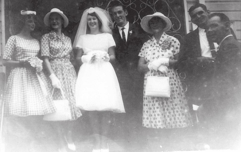 Wedding reception. Cecilia Toomey, Nell Campbell, Pat and Garry Cordwell, Lill Cordwell, Stan Cordwell and Ron Cordwell, 1963.