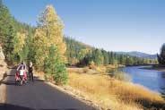 The Trail of the Coeur d Alenes nearly spans the Panhandle of Idaho as it runs along rivers, beside lakes and through Idaho s historic Silver Valley.