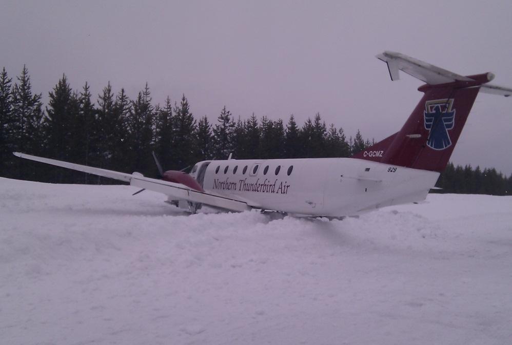 -5- Damage to Aircraft The aircraft sustained substantial damage. Both propellers were damaged when the blade tips came in contact with the snow banks.