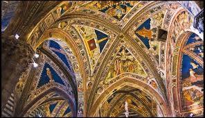 Its main façade was completed in 1380; the inlaid marble mosaic floor, is among the most elaborate in