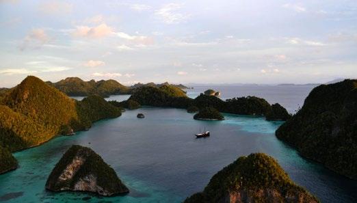 RAJA AMPAT December - April Located off the coast of West Papua, Raja Amapt is a collection of 1,500 pristine islands.