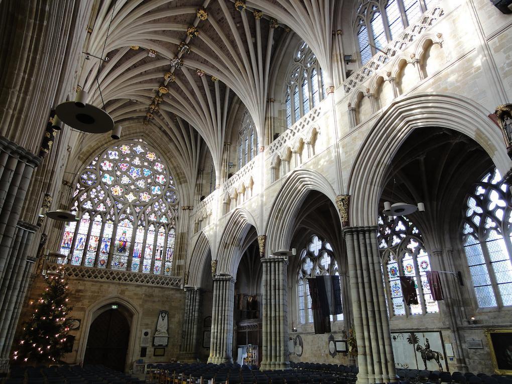 13. Exeter Cathedral Exeter Cathedral was complete by 1400, and features an early set of misericords, an astronomical clock, and the longest uninterrupted vaulted ceiling in England.