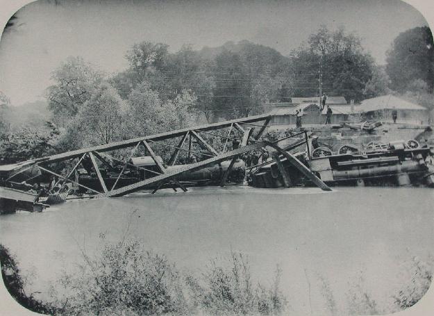 Figure 3 The Münchenstein train engines and bridge debris in the Birs 1882 and it had passed the railway department inspection in 1890 after the upgrade to accommodate heavier locomotives.