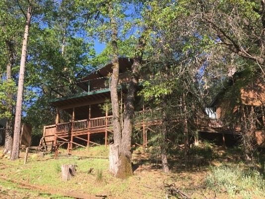 Two Large Decks with Lake/Marina/Mountain Views, BBQ, Table, Bar Counter, Gas Fire Pit, and hot tub (New Top Deck was complete in April 2016) Easy RV/Boat Parking off the road in front of the house,