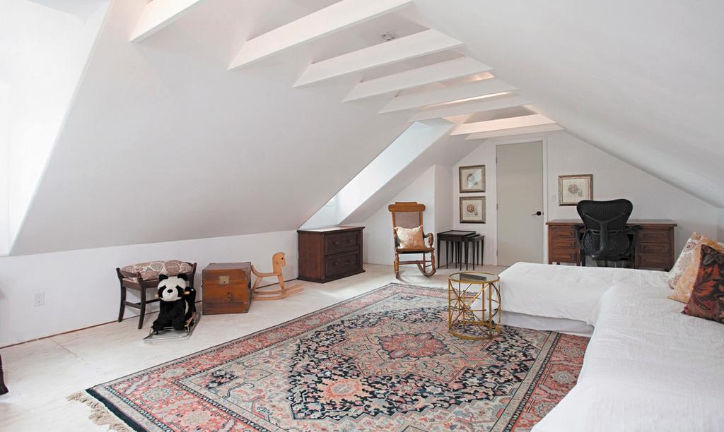 Another dramatic part of this home s recent renovations is the attic conversion that added square feet of useable space plus two large storage closets to the home.