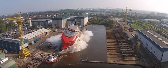 TRANSVERSAL SHIP LAUNCHING For shipyards located in narrow rivers (small shipyards), is common to use the