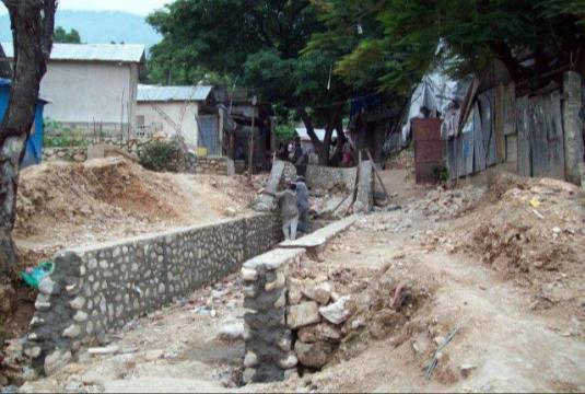 Drain works and footpaths mitigates flood risk and improves hygiene and sanitation.