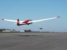 FREQUENTLY ASKED QUESTIONS ABOUT GLIDING: An aeroplane without an engine how does it fly? A simple example of how gliding works is if you imagine a car that has run out of petrol.