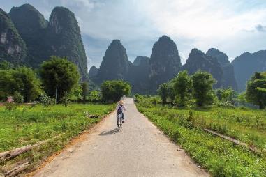 Day 13: Yangshuo Guilin Yangshuo sits in an exquisite rural location, surrounded by landscapes of jewel-green paddy fields and dramatic limestone karsts.