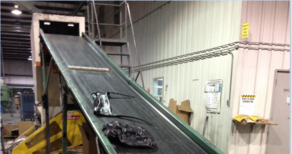 5. Place excess plastic on conveyor