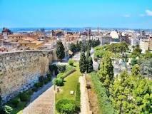 About Tarragona Tarragona is a port city in northeastern Spain s Catalonia region. Many ancient ruins remain from its time as the Roman colony of Tarraco.
