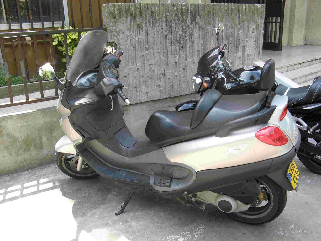 the luxury scooter with larger wheels and a larger engine than the traditional Vespa but still retaining the cleaner and more comfortable scooter body.