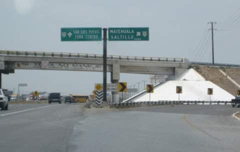 Second exit sign says MATEHUALA / SALTILLO CUOTA