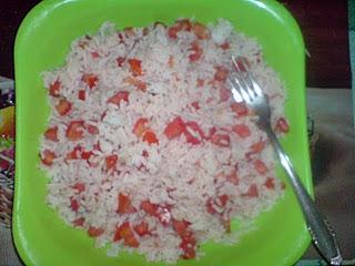Rice and Tomatoes Recipe: 200 grams of rice (any kind) 100 grams of finely chopped tomatoes (save the juice) 2 tablespoons olive oil 1 tablespoon dry oregano 1 tablespoon finely chopped parsley Salt