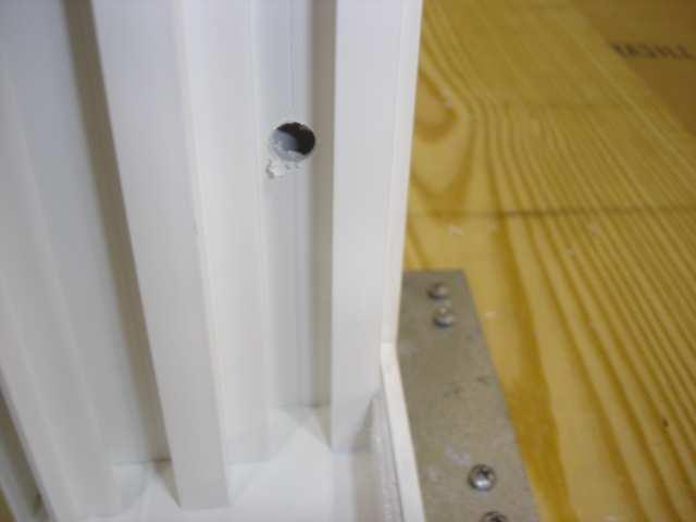 IV. 11 Secure frames to mullion a. Drill clearance holes for the screws using a 1/8 DIA x 3/8 DIA step drill.