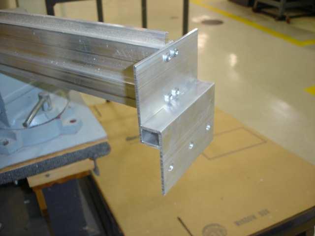 b. Concrete block opening kits i. Attach the steel plate to the notched end of the mullion as shown (see Fig. 12) ii.