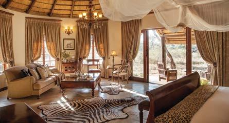 Dark tones of wood and thatch offset the natural colours of the bushveld.