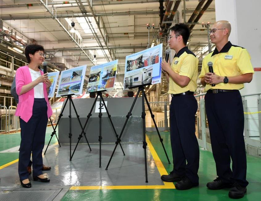 4. The Chief Executive Mrs Carrie Lam (Left), talks to high-speed train drivers Kim (2 nd