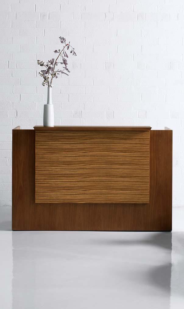Central Park Office Park Collection Finish: Gunstock Walnut Modesty: Zebrawood - Clear Finish Edge: Knife Reception station with exotic facade panel greets visitors with boldness and style.