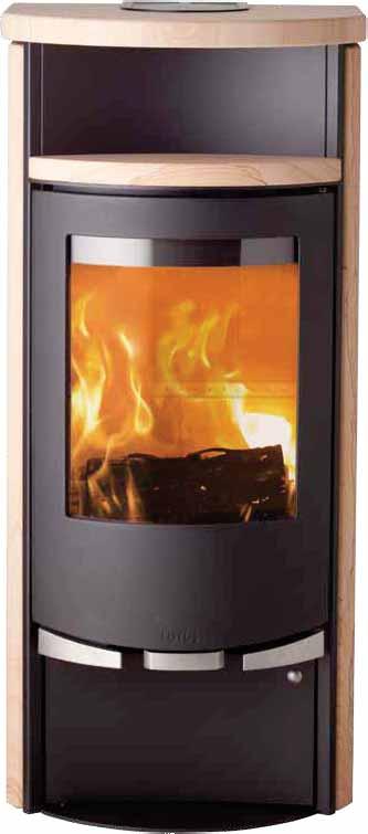 Solid soapstone covering combines the quick heat distribution of the wood stove with the slower