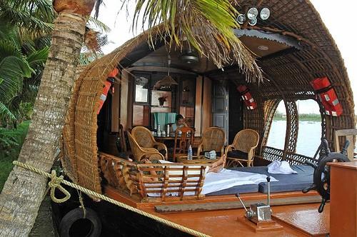 rooms and even balconies for angling Each boat has a fully equipped kitchen and an experienced cook to prepare authentic Kerala cuisine with sea food specialties and