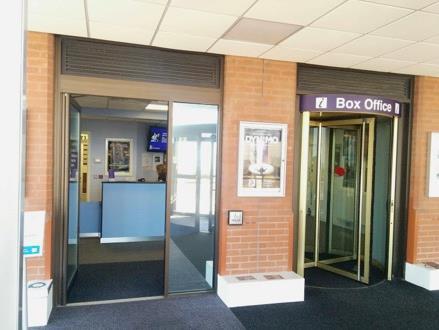 9 Box Office The Box Office is on the ground floor at the front of the venue and is fully accessible with: A push-pad automatic door Low level counter Induction loop Staff can provide information in