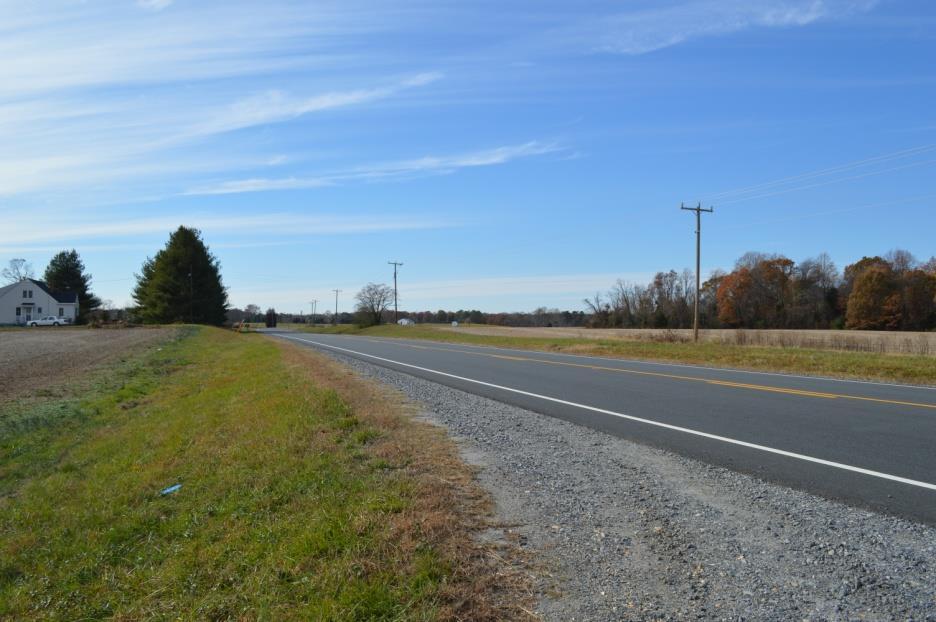 west, utilizing roads on the secondary system: Route 688 (James B. Jones Mem. Hwy.) from Route 3 north of town to Route 200 and Route 1036 (Harris Road) from Route 200 to Route 3 south of town.
