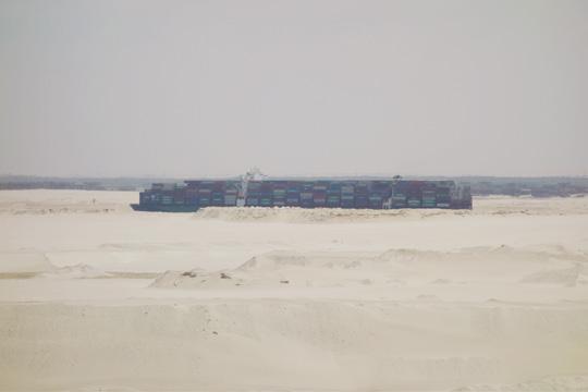 Entrance to the Suez Canal with Port Said Container Terminal on the port