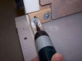If spacer washers are included with the threshold, place the washers between the mounting bracket and the panel lug.