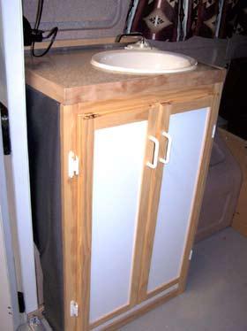 Unfold the side cabinet and tilt the top at a steep angle