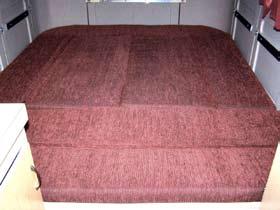 Cushions In Sleeping Configuration Remove the table by lifting up on the unattached end of the table to a