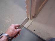 Tip 4: Grasp the top of the panel and pull down to flex the panel to assist in aligning the screw holes if necessary.