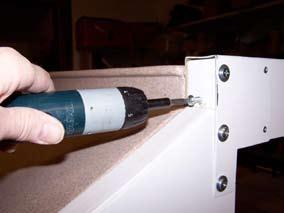 Align the lugs to the door frame and push the door frame