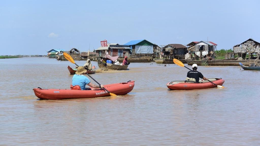 Day 3: Tonle Sap Lake Kayaking Expedition Photo courtesy of Nick Butler, Cambodia Director Today we ll head along the river through villages and rice elds to explore the lakeside village life on the