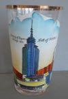 Lot # 126 - Glass Tumbler with a Multicolor Baked Enamel of the "Hall of Science" with "Century of Progress Chicago 1933." written next to the building.