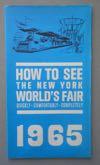 Lot # 366 - Folder "Snapshots at The Fair", "with fixed-focus and other simple cameras" from Kodak, with the Unisphere pictured on the cover.