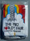 At the bottom is a wide view of the "expo '74' world's fair". The cache is printed in black and was created by "Art Craft". Size: 6 1/2" by 3 5/8" high.