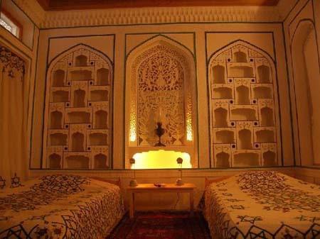 Built in traditional Uzbek style around a central courtyard, this friendly, charming hotel features the most refined Bukharan workmanship with wooden pillars and niches.