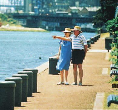 harbour access Residents of a suburb blessed by water can at last dip their toes in ABOVE, left to right: enjoying public access to the foreshore at