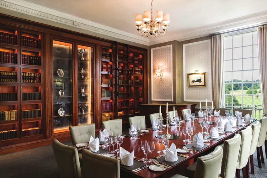 The Library: Fine old leather-bound volumes line this classic private dining room, boasting pleasant views over the estate.